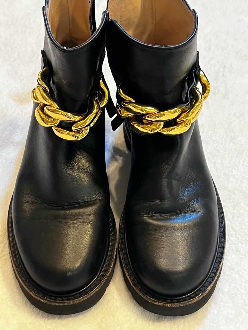 Stuart Weitzman Black Leather Ankle Boots with Chunky Gold Chain